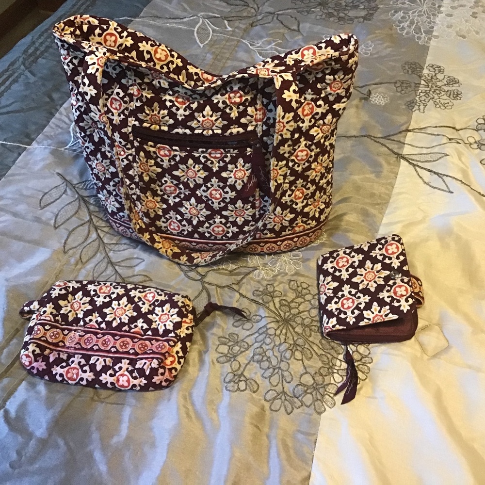 Vera Bradley med size tote style bag with matching small wallet and make up bag.